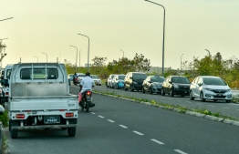 Vehicles parked at a road in Hulhumale'-Phase II--