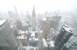 A view of  the Chrysler Building (C)  from The Summit at One Vanderbilt Observation Deck, during a snow storm in New York City on January 29, 2022. -- Photo: Timothy A. Clary / AFP