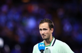 Russia's Daniil Medvedev speaks after after the men's singles final match against Spain's Rafael Nadal on day fourteen of the Australian Open tennis tournament in Melbourne on January 31, 2022. -- Photo: Martin Keep / AFP)