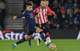 Manchester City's Portuguese defender Joao Cancelo (L) vies with Southampton's English midfielder Nathan Redmond (R) during the English Premier League football match between Southampton and Manchester City at St Mary's Stadium in Southampton, southern England on January 22, 2022.
Glyn KIRK / AFPManchester City's Portuguese defender Joao Cancelo (L) vies with Southampton's English midfielder Nathan Redmond (R) during the English Premier League football match between Southampton and Manchester City at St Mary's Stadium in Southampton, southern England on January 22, 2022. --  Photo: Glyn Kirk/ AFP