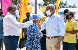 [File] Jumhooree Party leader, Qasim Ibrahim (L) greets President Ibrahim Mohamed Solih: Qasim has strongly criticized the government and called for justice for former President Abdulla Yameen
