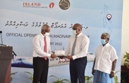 Island Aviation's Managing Director and Kuredhdhoo Holdings' honcho gifting a memorial boarding-pass to Maldives President Mr. Ibrahim Mohamed Solih -- Photo: President's Office