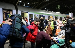 People arrive on a train from Ukraine’s border at Berlin’s main train station on March 2, 2022.
-- Photo: Tobias Schwarz / AFP