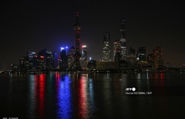Pudong district is pictured during a lockdown imposed as a preventive measure against the spread of the Covid-19 coronavirus, in Shanghai on March 28, 2022. - Millions of people in China's financial hub were confined to their homes on March 28 as the eastern half of Shanghai went into lockdown to curb the country's biggest ongoing Covid-19 outbreak. --Photo: Hector Retamal | AFP