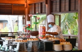 A chef in Kuredu Resort: the ministry is compiling data of tourism industry workers who have been serving the industry for more than 30 years -- Photo: Nishan Ali