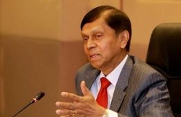 Governor of the Central Bank of Sri Lanka, Ajith Nivard Cabraal announced his resignation to make way for a new administration to manage the crisis -- photo: Daily Mirror