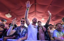 Fans react as French band L'Imperatrice performs onstage at the Coachella Valley Music and Arts Festival in Indio, California, on April 16, 2022. -- Photo: Valerie Macon / AFP