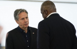 Secretary of State Antony Blinken (L) and Secretary of Defense Lloyd Austin (R) talk after speaking with reporters upon returning from their trip to Kyiv, Ukraine, and meeting with Ukrainian President Volodymyr Zelensky, on April 25, 2022, in Poland near the Ukraine border.  -- Photo by Alex Brandon / AFP