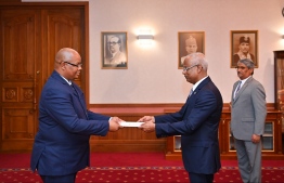 Sandile Edwin Schalk (L), the newly appointed ambassador to Maldives from South Africa presents his papers to President Ibrahim Mohamed Solih on May 17, in a ceremony held in the President's Office -- Photo: President's Office