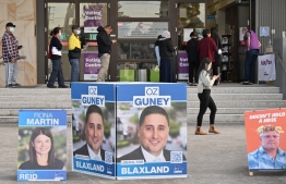 Voters queue up outside a pre-polling station in Berala electorate of Sydney on May 19, 2022, as Australians go to the polls on May 21 to decide who will run the country for the next three years. -- Photo: Saeed Khan / AFP