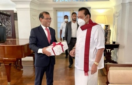 Former Prime Minister of Sri Lanka Mahinda Rajapaksa (L) with Parliament Speaker Mohamed Nasheed: The Maldives Journal claimed that Nasheed proposed Rajapaksa purchase a private villa from Soneva.