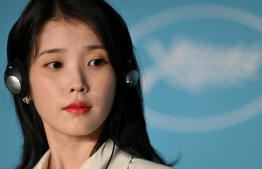 Lee Ji-eun attends a press conference for the film "Broker (Les Bonnes Etoiles)" during the 75th edition of the Cannes Film Festival in Cannes, southern France, on May 27, 2022. -- Photo: Julie Sebadelha/ AFP
