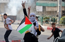 Children protesting in Palestine.-- Photo: AFP