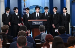 Korean band BTS appears at the daily press briefing in the Brady Press Briefing of the White House in Washington, DC, May 31, 2022, as they visit to discuss Asian inclusion and representation, and addressing anti-Asian hate crimes and discrimination. -- Photo:  Saul Loeb / AFP