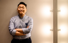 In this picture taken on May 27, 2022, South Korean singer and producer Psy poses during an interview with AFP, in a dance studio at his record label and entertainment agency P NATION, in the Gangnam district of Seoul. -- Photo: Anthony Wallace / AFP