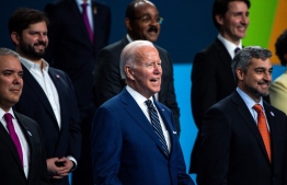 US President Joe Biden (C) gestures flanked by Colombia's President Ivan Duque (L), Chile's President Gabriel Boric (2nd L) and Paraguay's President Mario Abdo Benitez (R) during a family photo during the 9th Summit of the Americas in Los Angeles, California, June 10, 2022. -- Photo: Chandan Khanna / AFP