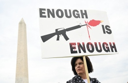Gun control advocates participate in the "March for Our Lives" as they protest against gun violence during a rally near the Washington Monument on the National Mall in Washington, DC, June 11, 2022. - Protesters are demonstrating across the US for tighter firearms laws to curb devastating gun violence plaguing the country. -- Photo: Saul Loebb / AFP