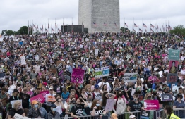 (FILES) In this file photo taken on May 14, 2022, abortion rights activist rally at the Washington Monument before a march to the US Supreme Court in Washington, DC. -- Photo: Jose Luis Magana / AFP