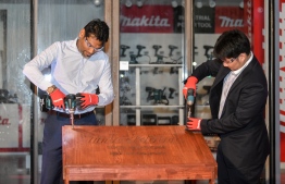 STO MD Mr. Hussain Amru and Makita Singapore's Assistant General Manager Mr. Ikeda San at the opening ceremony of the new STO Makita Showroom--