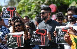 Sri Lankan protesters hold posters calling for Maldivian government not to provide protection for Sri Lankan President Gotobaya Rajapakse on Wednesday July 13, 2022 -- Photo: Nishan Ali / Mihaaru