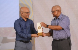 Dhiraagu CEO, Ismail Rasheed receiving the "50 Years of Tourism" award by Maldives Association of Tourism Industry (MATI) -- Photo: Dhiraagu