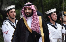 Saudi Crown Prince Mohammed bin Salman walks past a guard of honour, prior to his meeting with Greek prime minister at the prime minister's office in Athens on July 26, 2022: the Crown Prince is to meet French President Macron on Thursday  -- Photo: Louisa Gouliamaki / AFP