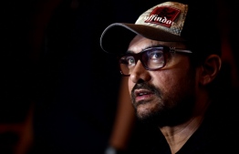 (FILES) In this file photo taken on November 26, 2018, Bollywood actor Aamir Khan attends the Cinestaan India's storytellers script contest in Mumbai. - Years-old criticisms of Narendra Modi's India are returning to haunt megastar Aamir Khan ahead of the release of his Bollywood remake of "Forrest Gump", with Hindu hardliners swamping social media with boycott calls. -- Photo: AFP