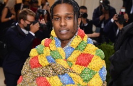 (FILES) In this file photo taken on September 13, 2021 US rapper A$AP Rocky arrives for the 2021 Met Gala at the Metropolitan Museum of Art in New York. - US rapper A$AP Rocky was charged August 15, 2022 over an alleged shooting in Hollywood last year. The 33-year-old, whose real name is Rakim Mayers, faces two counts of assault with a semiautomatic firearm, the Los Angeles District Attorney's office said. -- Photo: Angela Weiss / AFP