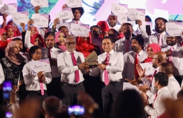 PNC leader Abdul Raheem Abdulla presenting the presidential ticket on behalf of PPM and PNC to former president Abdulla Yameen Abdul Gayoom -- Photo: PPM