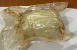 The parcel containing the alleged narcotic substance, smuggled via Post-- Photo: Customs