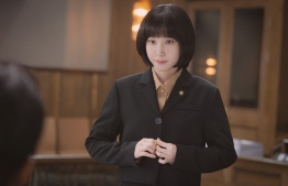 This undated handout image obtained on September 1, 2022 from Netflix in Seoul shows South Korean actress Park Eun-bin playing a role of the high-functioning autistic lawyer Woo Young-woo in K-drama "Extraordinary Attorney Woo". - A chart-topping Netflix K-drama about a high-functioning autistic lawyer is prompting soul-searching in South Korea, where people on the spectrum say they feel "erased". -- Photo by Handout / Netflix / AFP)