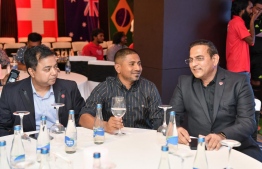 Minister Ahmed Mahloof with Coca-Cola officials. -- Photo: Nishan Ali