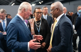 President Ibrahim Mohamed Solih speaks to King Charles at last year's COP26 summit: The President has decided to attend Queen Elizabeth's funeral in the UK -- Photo: Getty Images