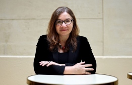 In this file photo taken on June 2, 2022 Canadian atmospheric scientist and professor of political science at Texas Tech University Katharine Hayhoe poses during an AFP interview in Paris. (Photo by Thomas COEX / AFP)