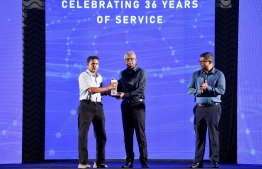 President Solih awarding plaques to employees who served MPL for more than 30 years -- Photo: Nishan Al