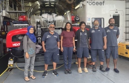 Environment Minister Aminath Shauna poses for a photo with some of the Maldivian research team participating in the country's largest marine study -- Photo: Nekton