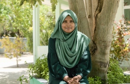 Ms. Shamha Yoosuf, travels between her home island Naalaafushi and place of work in Muli of the same atoll everyday-- Photo: Mihaaru