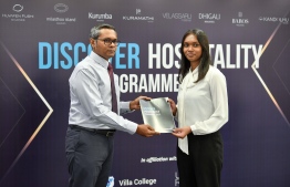 Universal Foundation "Discover Hospitality" program students receive internship certificate-- Photo: Nishan Ali 