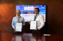 Tourism Minister Dr. Abdulla Mausoom and Dhiraagu CEO and MD Ismail Rasheed signing the partnership agreement. Photo: Dhiraagu