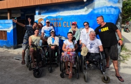 Russian divers with special needs and others who came with them pose for a photo outside the Fuahmulah Scuba Club -- Photo: Fuahmulah Scuba Club