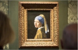 Vermeer’s Girl with a Pearl Earring has been examined by restorers after the action and found to be undamaged. -- Photo: Lex van Lieshout