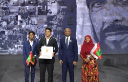 (FILE) President Ibrahim Mohamed Solih (R2) with students from Hira School that went to UAE to receive the Zayed Sustainability Prize in January this year --