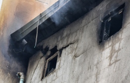 Garage Fire Incident: significant damages to buildings