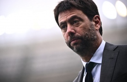 (FILES) In this file photo taken on October 15, 2022 Juventus' President Andrea Agnelli attends the Italian Serie A football match between Torino and Juventus at the Olympic stadium in Turin. - The entire board of directors at Juventus has resigned, including president Andrea Agnelli and vice president Pavel Nedved, the Italian Serie A club said in a statement on November 28, 2022. -- Photo: Marco Bertorello / AFP