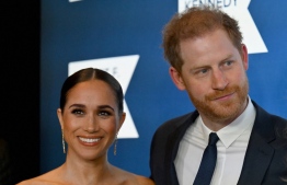 Prince Harry, Duke of Sussex, and Meghan, Duchess of Sussex, arrive at the 2022 Robert F. Kennedy Human Rights Ripple of Hope Award Gala at the Hilton Midtown in New York on December 6, 2022. -- Photo: Angela Weiss / AFP