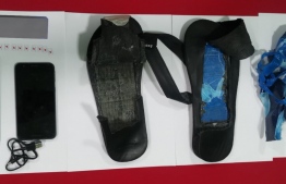The contrabands that were concealed in the man's sandals. PHOTO: Commissioner of Prisons Ahmed Mohamed-Fulhu Twitter