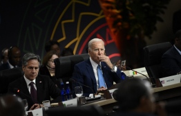 US President Joe Biden (C), with Secretary of State Antony Blinken (L), listens at the leader's session during the US-Africa Leaders Summit at the Walter E. Washington Convention Center in Washington, DC, on December 15, 2022. -- Photo: Brendan Smialowski / AFP