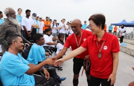 Chinese Ambassador to Maldives, Wang Lixin, participates in the Maldives-China Friendship Run held at Sinamale' Bridge to mark the 50th anniversary of the establishment of political relations between Maldives and China.-- Photo: China Embassy