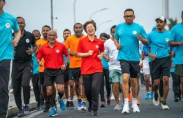 Maldives China Friendship Run held at Sinamale' Bridge to mark the 50th anniversary of the establishment of political relations between Maldives and China.-- Photo: China Embassy
