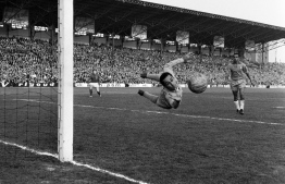 Brazilian goalkeeper Gilmar stops the goal, on April 28, 1963 at Colombes during the match France vs Brazil. - The Brazilian team, double world champion, played for the first time in France and 
Pele scored all 3 goals for his team which wins the match 3-2. -- Photo by AFP